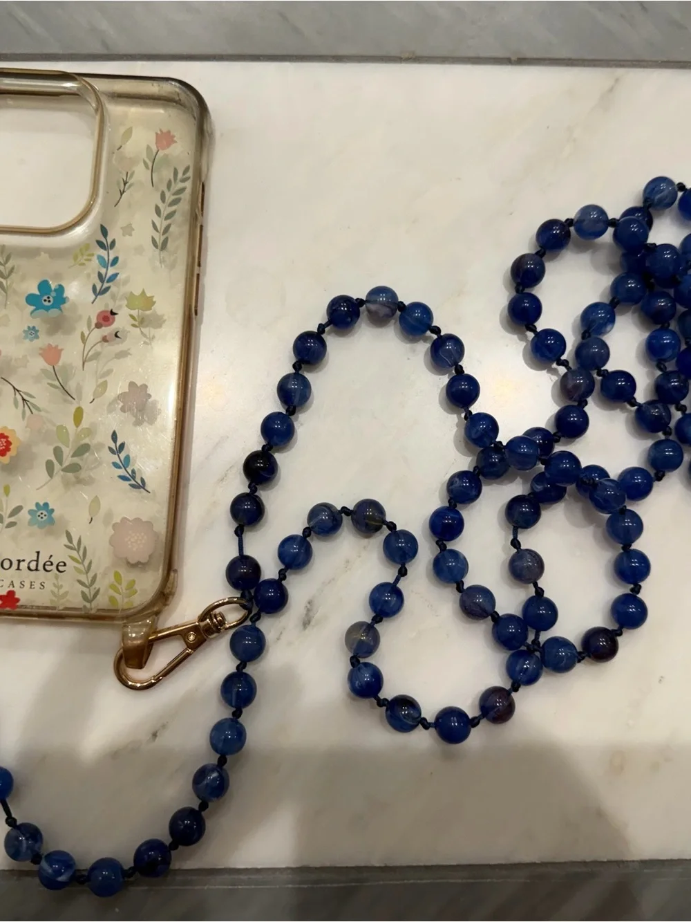 Cordee Floral Clear iPhone 14 Pro Case with Blue Lagoon Phone Chain